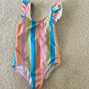 Roxy one piece bathing suit. Multi colors, girls size 4.